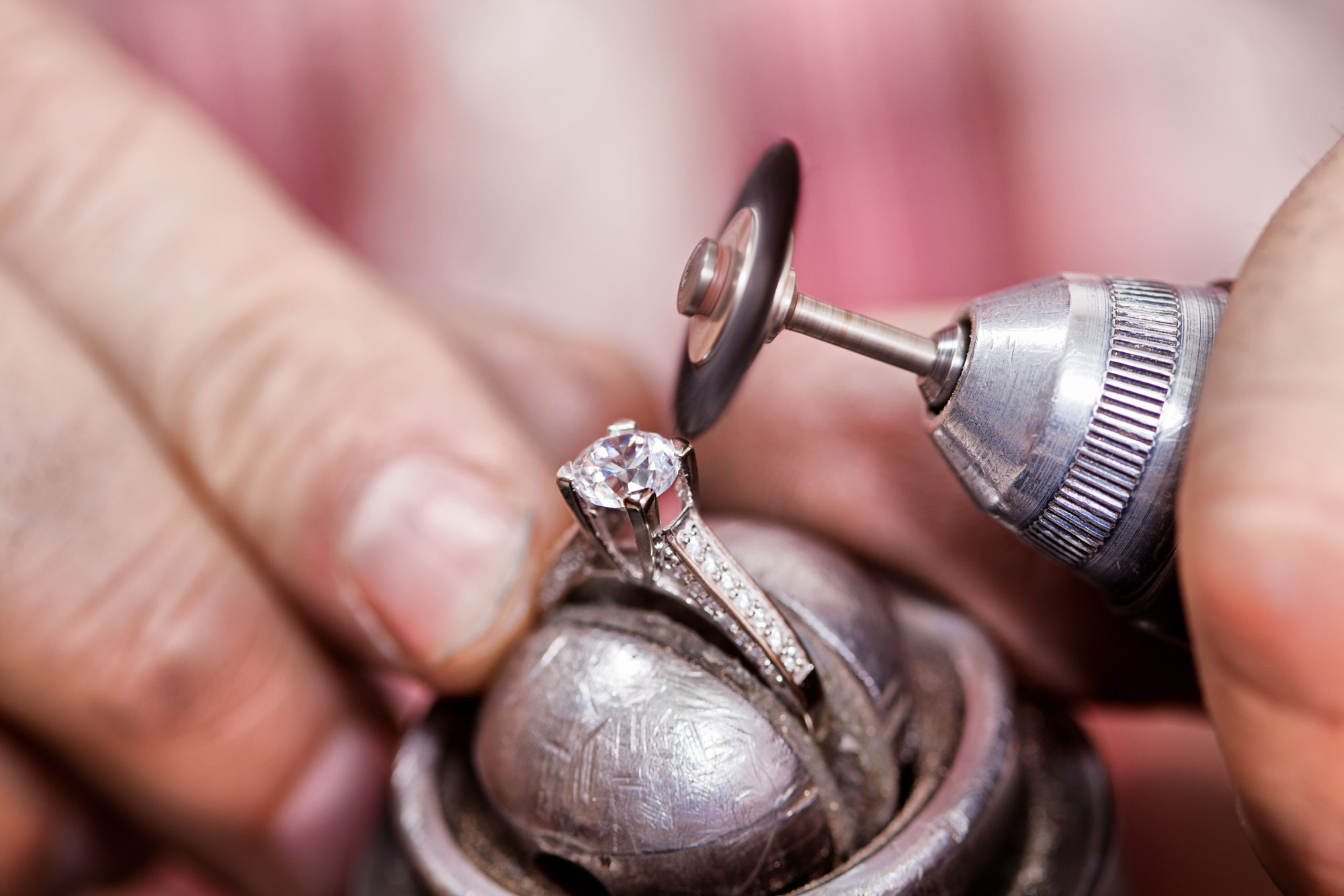 Jeweler Setting a Diamond Ring